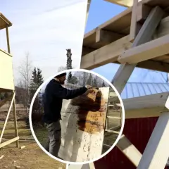 Byggnation av jakttorn. En man målar träet, som påminner om en stor lastpall, med skyddande olja.