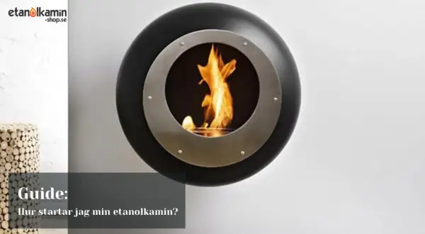 En modern, rund etanol bränsle kamin med flammor som lyser upp rummet. En guide visar hur du startar din etanolkamin.