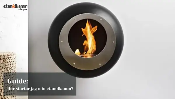 En modern, rund etanol bränsle kamin med flammor som lyser upp rummet. En guide visar hur du startar din etanolkamin.