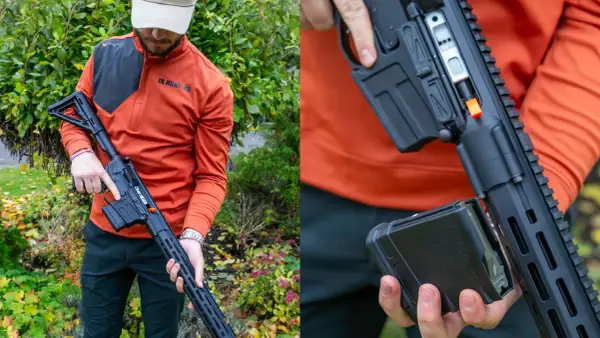 Man i orange tröja med en AR-15 redo för jakt. Magasinet tas ur vapnet.
